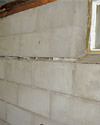 Severely buckling foundation walls in a home in Hicksville in need of repairs.