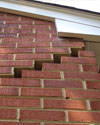 Serious damage to a foundation wall due to settlement of a home in Ronkonkoma